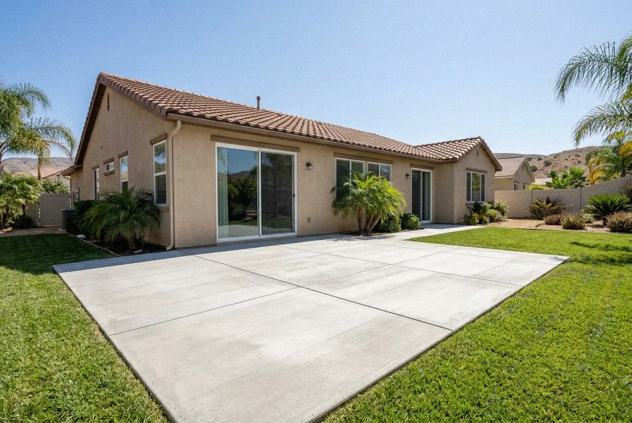 Broom-finished concrete patio behind a Canyon Crest home in Riverside